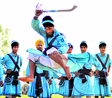 A Nihang performs gatka at the Kila Raipur Sports Festival on Friday