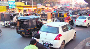 Traffic moves at a snails pace at Hussain Pura Chowk, which is the main converge point of the stretch.