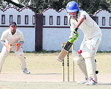 A batsman in action in a match in the 61st Dehradun District Cricket League played at Survey Stadium in Dehradun on Saturday