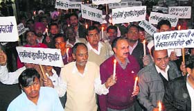 Residents take out a candle march against the rape accused at Dabwali in Sirsa