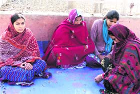 Nidhi Jain sits on an indefinite fast outside the mini-secretariat in Fatehabad on Saturday
