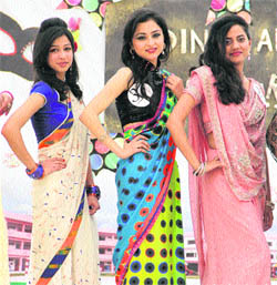 Students of MGN Public School participate in a modelling show during the farewell party of class XII.