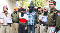 Accused in police custody in Ludhiana on Saturday. Photo: Inderjeet Verma