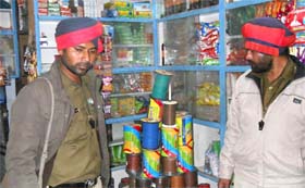 Policemen with seized China Dor in Mata Rani Wali Gali.
