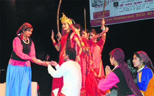 Local artistes belonging to the Garhwali community present a cultural programme during Uttarakhand Rang Manch 2013 at the Tagore Theatre in Chandigarh on Sunday.
