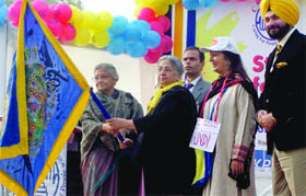 Gursharan Kaur, the wife of Prime Minister Manmohan Singh, flags off a Walk for life to support the cause of cancer patients as Delhi Chief Minister Sheila Dikshit, CPI (M) leader Brinda Karat and former Indian cricketer Navjot Singh Sidhu look on at Rajpath in New Delhi 