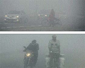 Foggy ride: Commuters have a tough time crossing Jalandhar-Amritsar National Highway due to heavy fog on Sunday morning