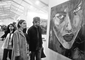 Visitors at the India Art Fair in New Delhi on Sunday.