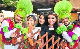 Artistes from Punjab after their performance at the 27th Surajkund Art and Craft Mela in Faridabad on Sunday.
