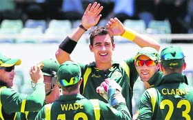 Mitchell Starc celebrates taking one of his five wickets for 20 runs during the second ODI between Australia and the West Indies at the WACA ground on Sunday.