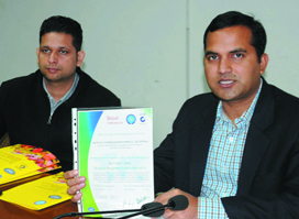 Deputy Commissioner Kamal Kishore Yadav shows the ISO 9001:2008 certificate issued to his office, in Bathinda on Monday.
