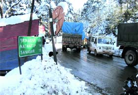 Vehicles stranded at Patnitop in Ramban district as traffic on the Jammu- Srinagar National Highway was suspended on Monday after heavy snowfall and rain in the state