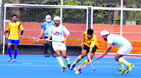 A match in progress on the opening day of the seventh All-India Jagtar Memorial Hockey Tournament (U-21) at the PAU, Ludhiana, on Monday.