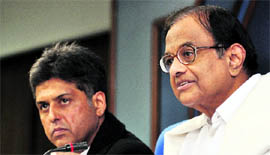 Union ministers P Chidambaram (R) and Manish Tewari at a press conference in New Delhi on Monday.