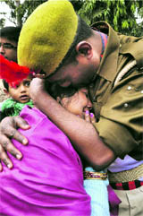 A sub-inspector hugs his mother after a passing-out parade in Moradabad on Monday.