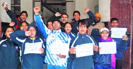 Refused permission, archers of Maharishi Dayanand University raise slogans against Guru Nanak Dev University officials in Amritsar on Tuesday.