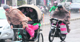Continuous showers in Amritsar give commuters a tough time.