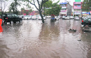 A waterlogged parking area in the Sector 42 market after rain in Chandigarh on Tuesday.