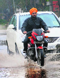 a waterlogged road in the Industrial Area, Phase I, in Panchkula.