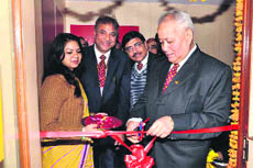 Mahesh Kumar Pangtey, Field General Manager of Punjab National Bank, inaugurates the retail assets branch of the bank in Dehradun on Tuesday. 