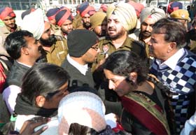 Cops try to pacify the agitating EGS teachers in Moga on Wednesday