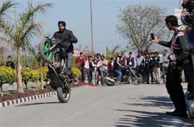 A biker thrills with his stunt
