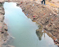 Water gets accumulated in front of shops in Naya Gaon, Mohali. 