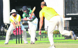 Players in action during a cricket match of the fourth Kings-XI Punjab Cricket Cup at the PCA Stadium, Mohali, on Wednesday. 