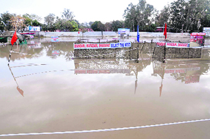Rainwater inundates the Army recruitment ground in Karnal on Wednesday.