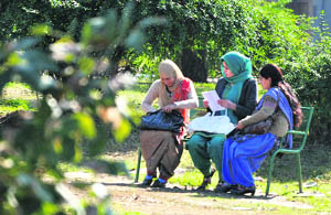 Girls enjoy a sunny day out in Jammu on Wednesday. 