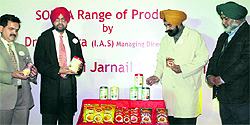 Managing Director of Markfed Dr KS Sra and Chairman Jarnail Singh Wahid show the newly launched range of products in Jalandhar