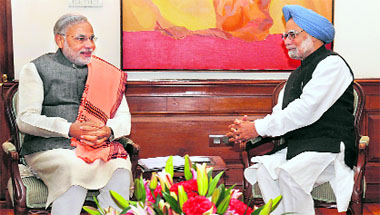 Gujarat CM Narendra Modi with PM Manmohan Singh in New Delhi on Wednesday. 