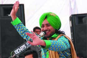 Punjabi singer Satinder Sartaaj performs during a cultural festival at the Baba Farid Group of Institutions near Bathinda on Thursday