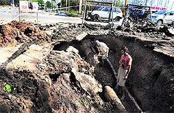 Labourers work on a damaged water pipeline in Sector 49, Chandigarh, on Thursday
