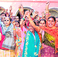 Residents stage a protest against discrepancies in the voter ID card process at the Municipal Corporation office in Haridwar on Thursday