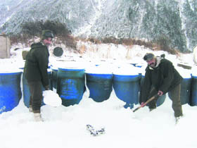 ITBP jawans clear snow from a forward post near the Lipulekh Pass on the China border in Pithoragarh district on Thursday.