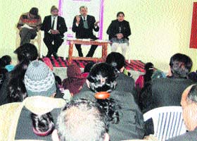 The CJM, Narender Sharma (second from right), addresses para legal volunteers at Hisar