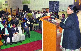 Haryana Education Minister Geeta Bhukkal addresses a gathering during a seminar held at the indoor hall of Jahan Aara Ground in Jhajjar