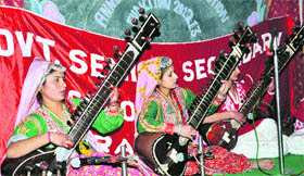 Students of Government Senior Secondary School for Girls present a classical perfomance on the annual prize distribution function in Dharamsala on Wednesday.