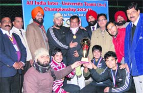 Proud winners: Players of Aligarh Muslim University in a jubilant mood after winning the All-India Tennis (Men) Championship, held at the NIT, Jalandhar