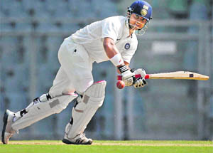 Rest of Indias Suresh Raina plays one on the onside on Day Two of the Irani Trophy in Mumbai on Thursday. 