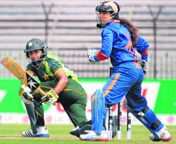 Pakistan batswoman Nida Rashid plays a shot on her way to a half-century against India during the Women's World Cup match at in Cuttack on Thursday. 