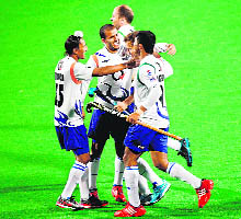 UP Wizards players celebrate their 4-1 win over Delhi Waveriders in New Delhi on Thursday. 