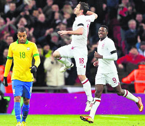 Frank Lampard celebrates his decisive goal against Brazil at Wembley Stadium, London, on Wednesday night. 