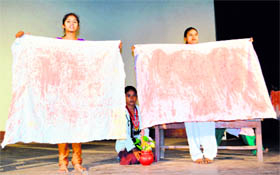 Students and volunteers of the American Indian Foundation's Project O3 stage a play on female foeticide to mark the first anniversary of the project in Amritsar on Friday.