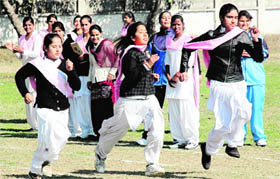 Students participate in a race at the annual sports meet in SR Government College for Girls in Amritsar on Friday.