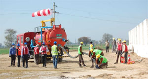 A mock drill underway at village Katarsinghwala in Bathinda district on Friday.
