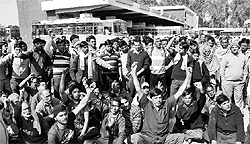 Roadways employees protest in Karnal on Friday, seeking the cancellation of 3,519 permits issued to private buses
