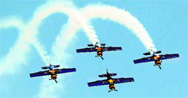The Czech Flying Bulls Zlin 50LX single-engine and single-seater aerobatic display team performs on the 3rd day of Aero India in Bangalore on Friday.