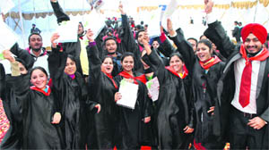 Students in a jubilant mood after receiving their degrees during the annual convocation of Khalsa College, Patiala, on Friday. 